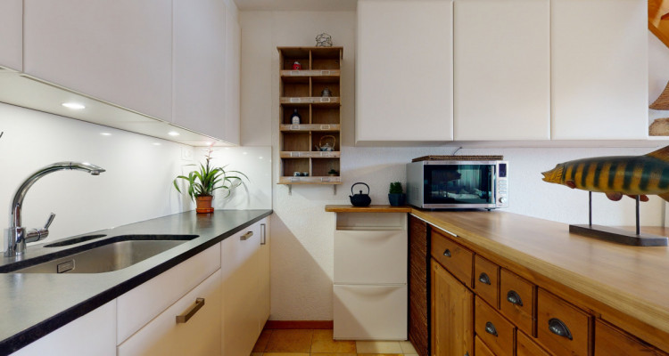 Duplex avec mezzanine et surcombles au coeur de Gland. Un charme fou! image 4