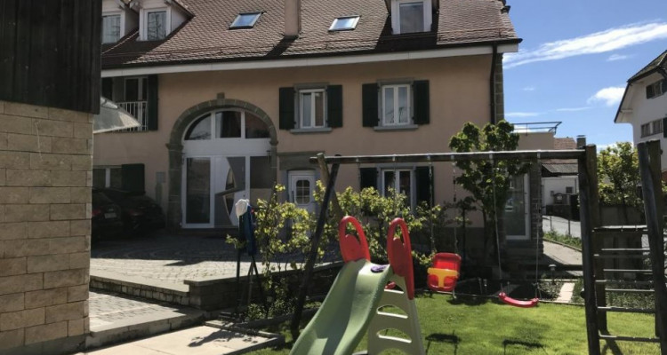Bien de rendement : 2 appartements et une grange à transformer image 1
